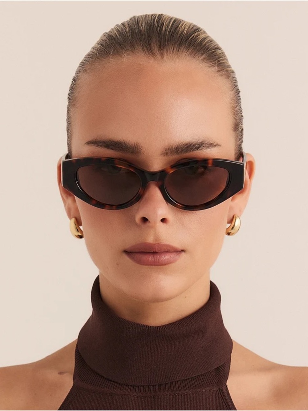 Miu Miu Tortoiseshell Sunglasses with Gold Logo Accent